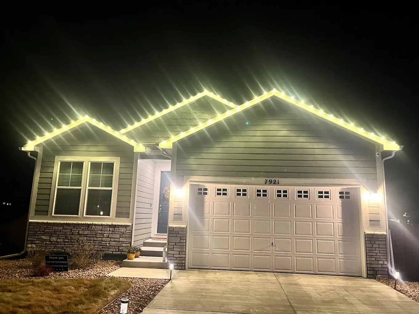 Warm white LED roofline on a single-family home — Front Range portfolio install